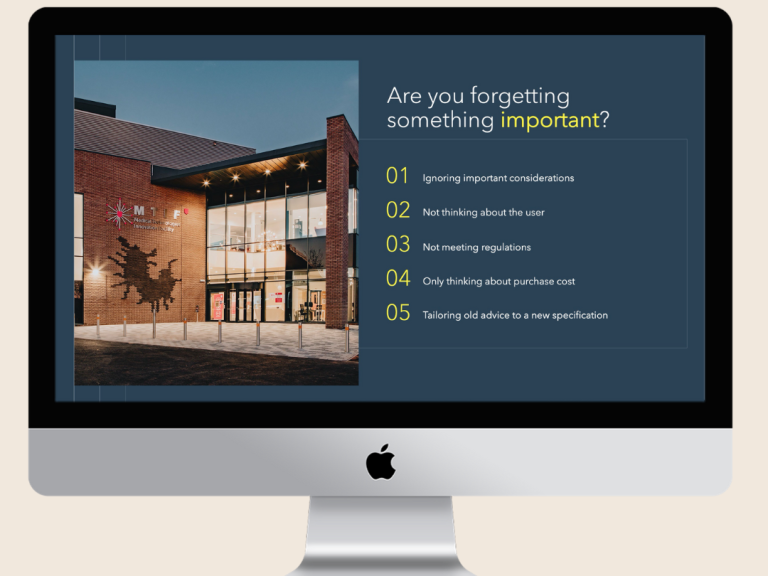 A modern building with large windows and a text prompt about remembering important things.